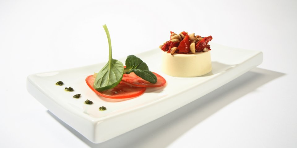 Flan de Passendale Classic au carpaccio de tomates et de pignons de pin