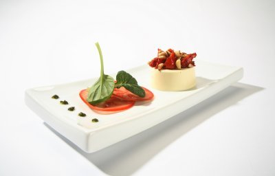 Flan de Passendale Classic au carpaccio de tomates et de pignons de pin