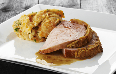 Rôti de porc en croûte d’orange et stoemp aux carottes