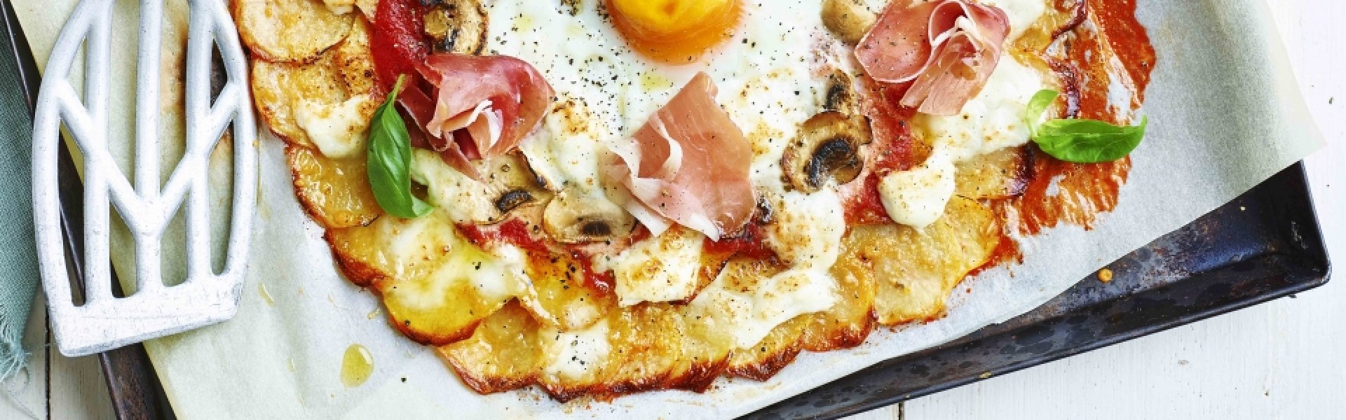 Une délicieuse pizza maison, bien de chez nous Une délicieuse pizza maison, bien de chez nous